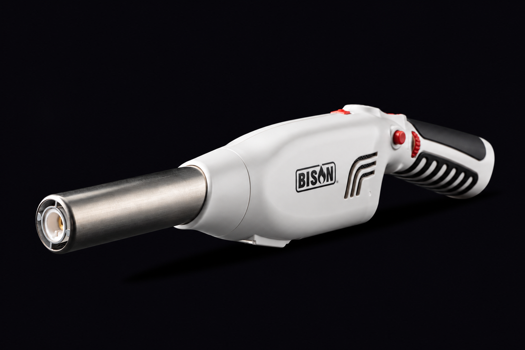 A Bison brand Airlighter with a metallic silver nozzle and an white body with a black textured grip, shown against a solid black background.