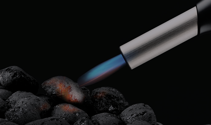 Bison Airlighter directing airflow at glowing charcoal