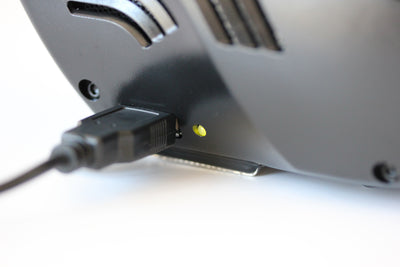 Airlighter 520 charging port with green light indicating it is fully charged